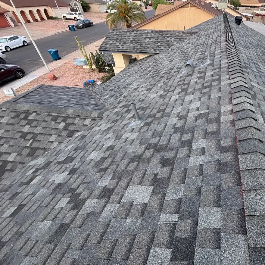 Finished architectural shingle roof seen from the ridge